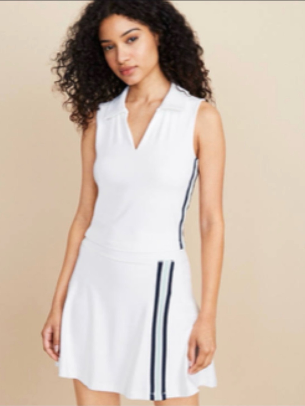 White Sleeveless Tennis Top with Navy and Blue Side Stripes